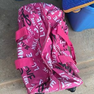 PINK rolling luggage